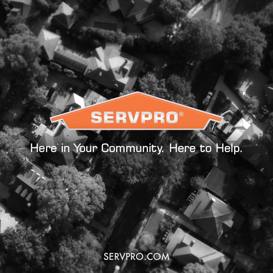 "Here in Your Community. Here to Help." with Servpro logo displayed over a community. 